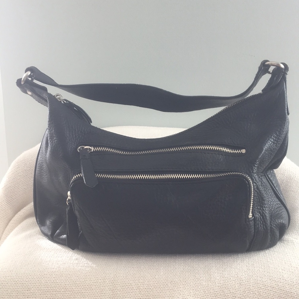 Cole Haan black textured leather shoulder bag.